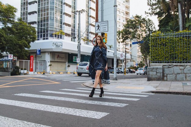 Photo full length of woman on road in city