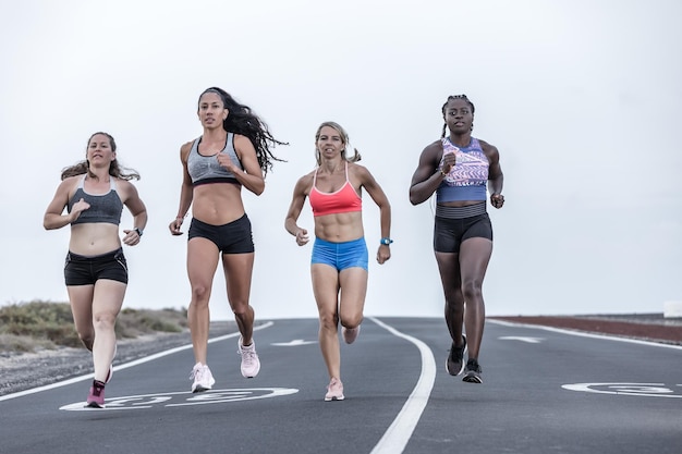 Photo full length of woman running on road