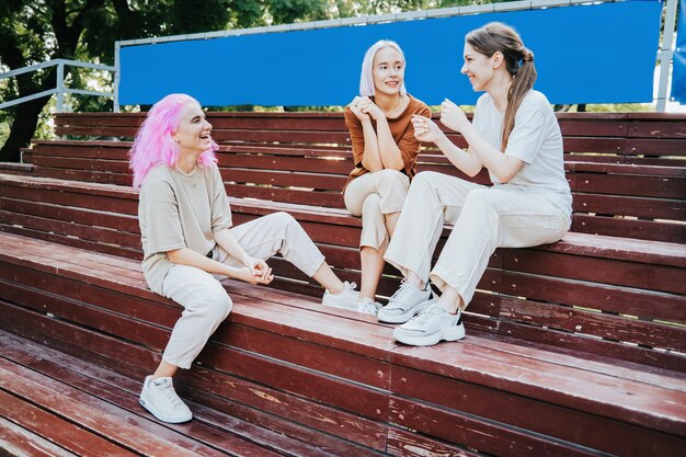 Full length of woman sitting on bench