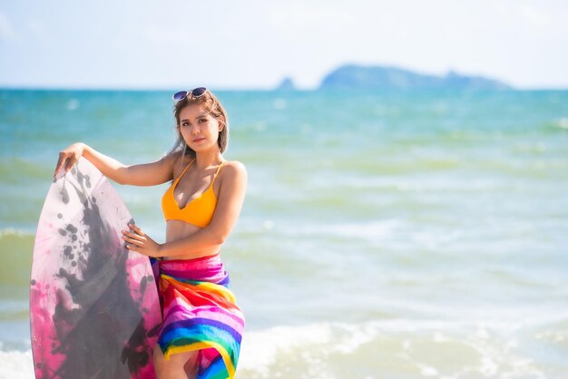 Full length of woman standing on beach