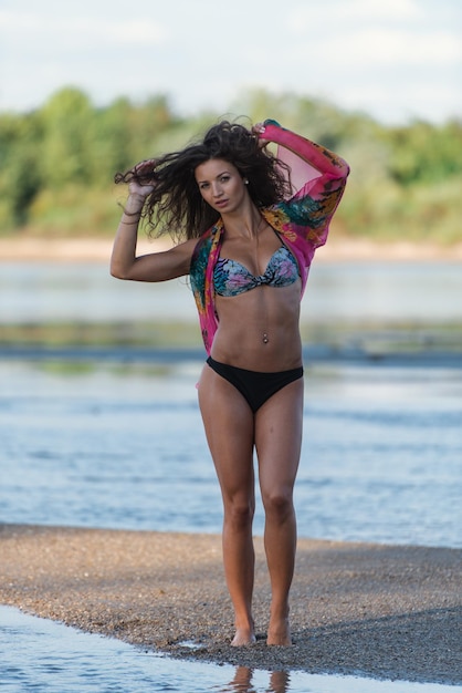 Photo full length of woman standing at beach