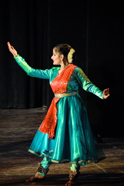 Full length of woman standing on stage