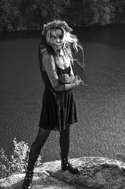 Full length of woman standing in water