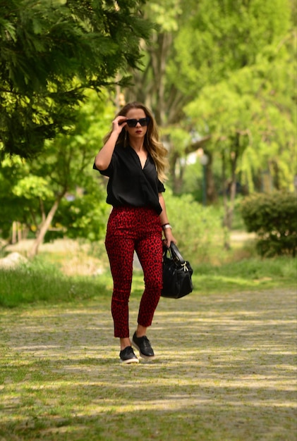Full length of woman walking at park