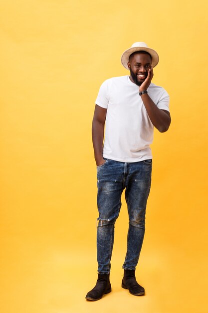 Full length young handsome african american man looking away