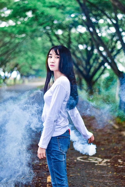 Full length of young woman standing on land