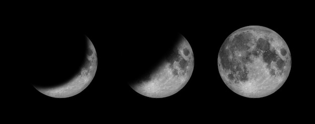Полнолуние и фаза полумесяца изолируют на черном космосе и показывают отражение гравитации затмения на поверхности Луны