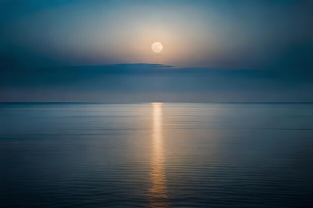 Photo a full moon is visible over the ocean