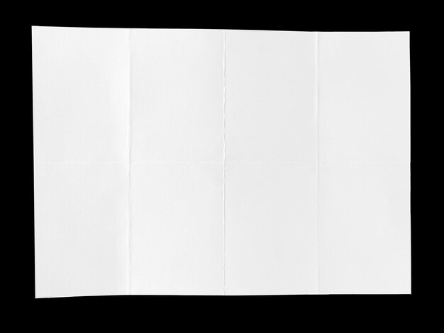 Photo full page of white paper folded and isolated on black background