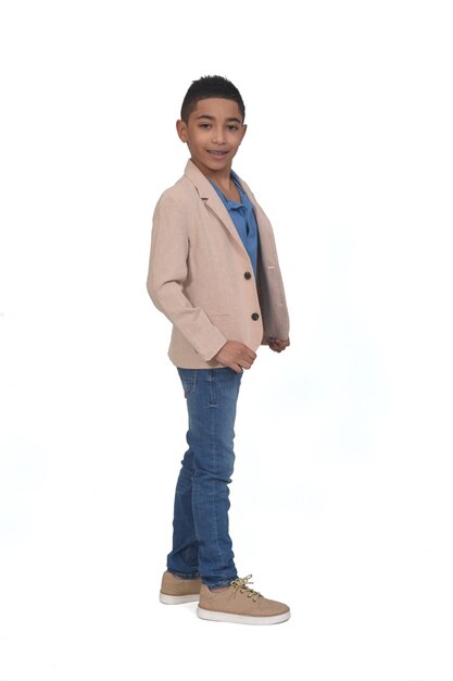 Photo full portrait of boy with blazer looking at camera on white background