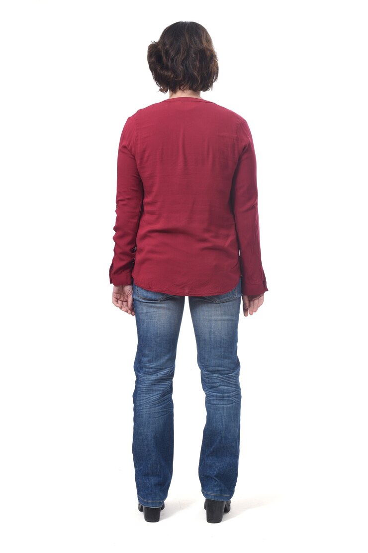 Full portrait of a woman from behind on white