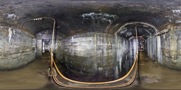 Full seamless panorama 360 degrees angle view inside ruined abandoned military underground casemates fortress of the First World War in equirectangular spherical projection