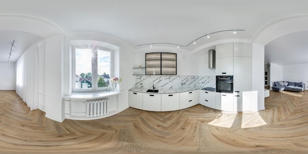 Full seamless spherical hdri 360 panorama view in white interior of modern luxure kitchen in studio apartments with cupboard with lighting in equirectangular projection VR content