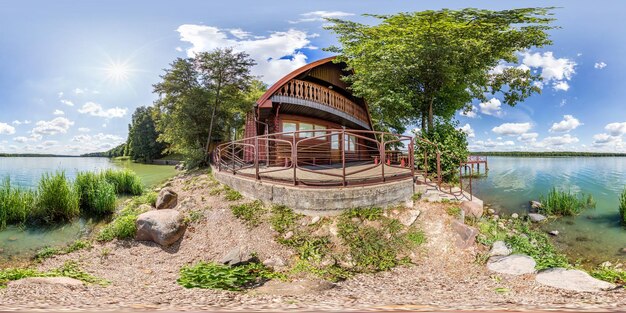 Full seamless spherical hdri panorama 360 degrees angle view near abandoned homestead castle with columns near lake in equirectangular spherical projection with zenith and nadir for VR content
