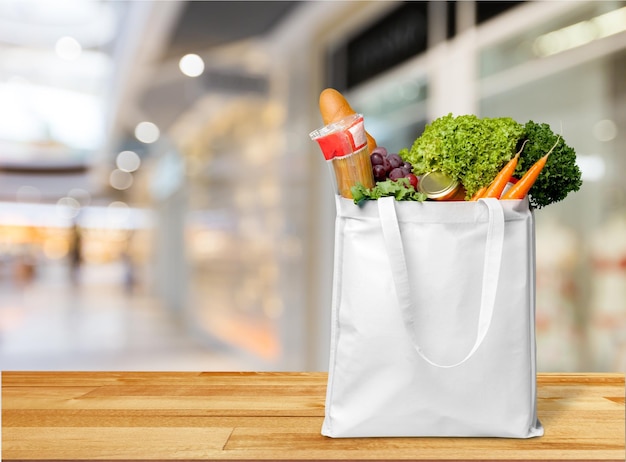 Photo full shopping  bag, isolated over  background