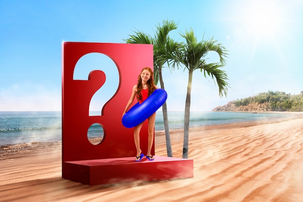 Full shot girl at beach with question mark