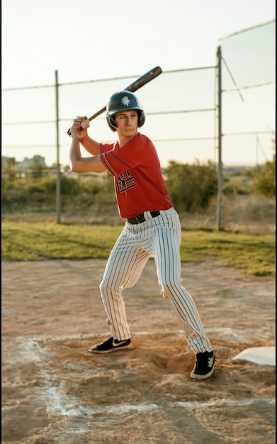 Full shot man playing baseball