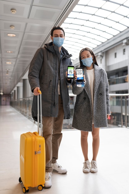 Photo full shot people with health passports and masks