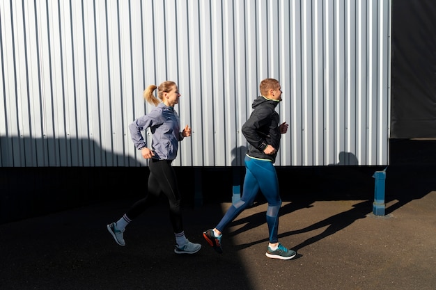 Full shot people working out together