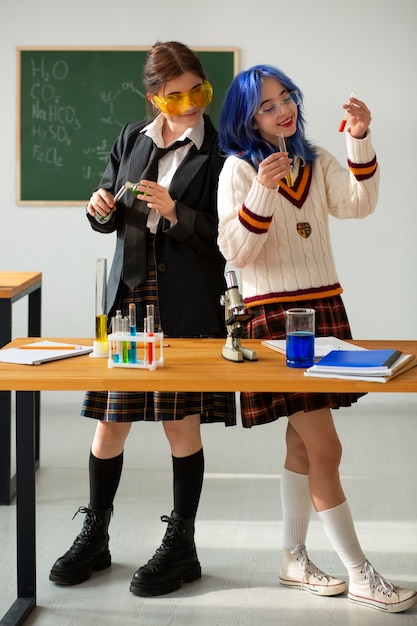 Full shot queer girls at school