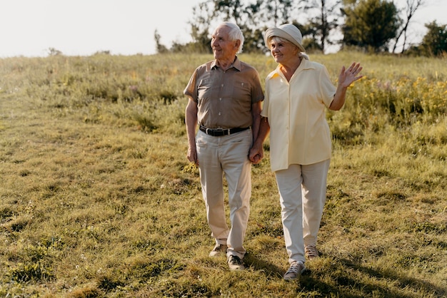 Full shot senior couple outdoors