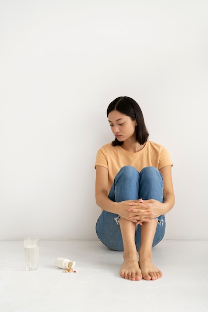 full shot woman dealing with imposter syndrome