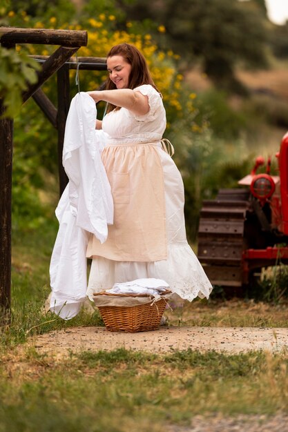 Full shot woman doing chores