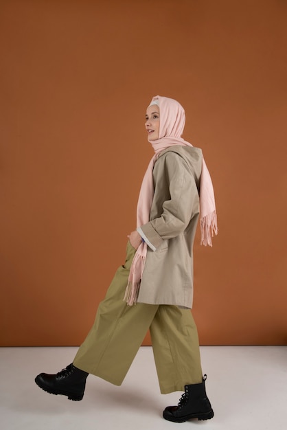 Full shot woman wearing hijab