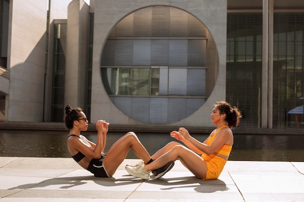 Full shot women doing sport together