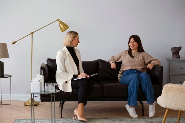 Photo full shot young woman undergoing therapy