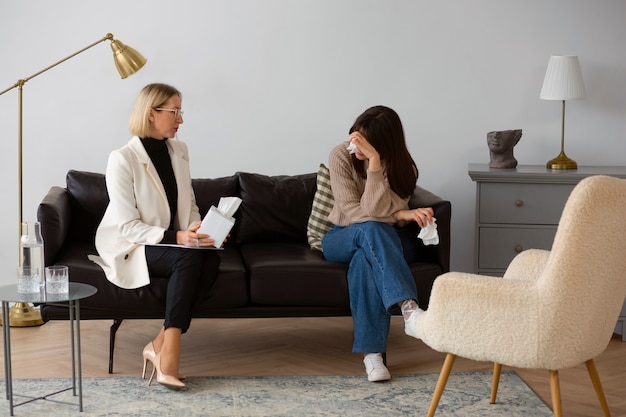 Photo full shot young woman undergoing therapy