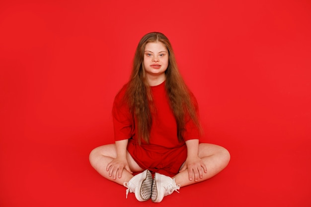 Photo full shot young woman with down syndrome