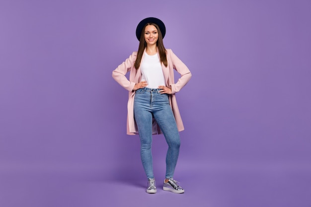 Full size photo charming pretty lovely attractive girl put hands pocket enjoy spend weekend free time holidays with friends wear stylish modern clothes isolated over purple color background