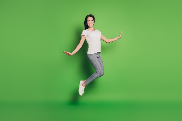 Full size photo of jumping woman