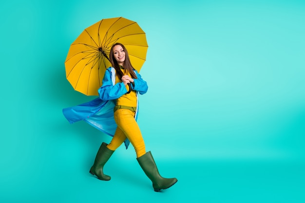 full size profile positive lady walk with umbrella