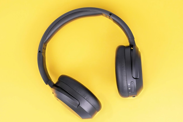 Fullsize headphones on a yellow background