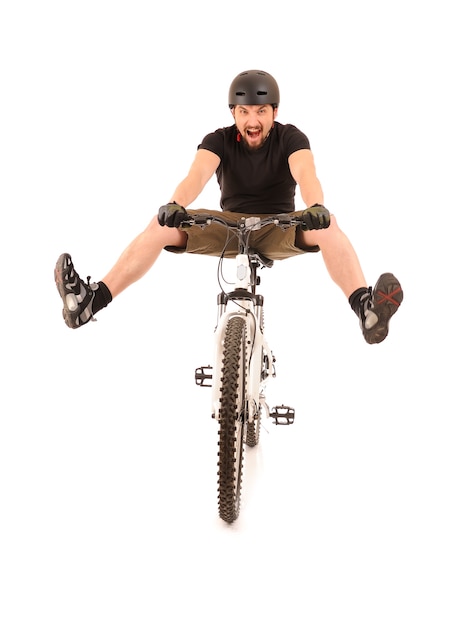 Fun bicyclist isolated on white, studio shot.