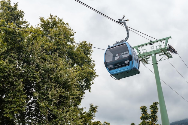 Funchal cable car cabin going up the mountain from the beach a cloudy summer day Madeira