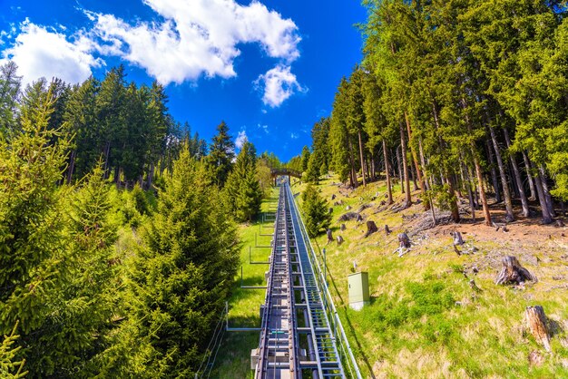 Funicular road in alps forest Davos Graubuenden Switzerland