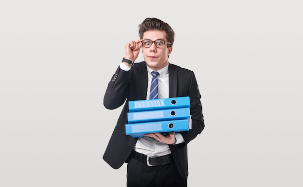 Funny accountant with folders in studio