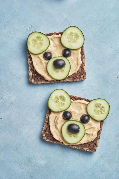 Funny bear toast with cucumber and hummus toasts