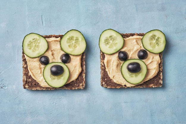 Funny bear toast with cucumber and hummus toasts