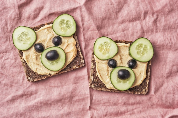 Funny bear toast with cucumber and hummus toasts