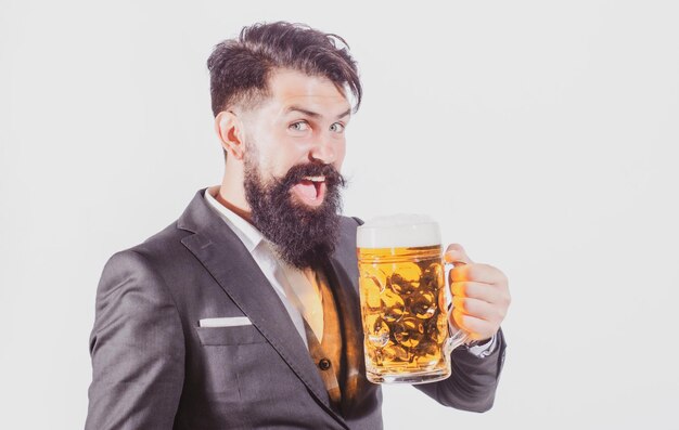 Funny bearded drunk hipster man holds craft beer