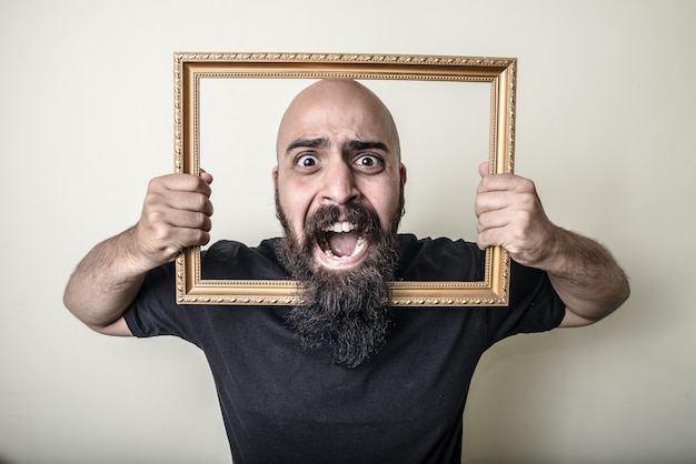 funny bearded man with golden frame