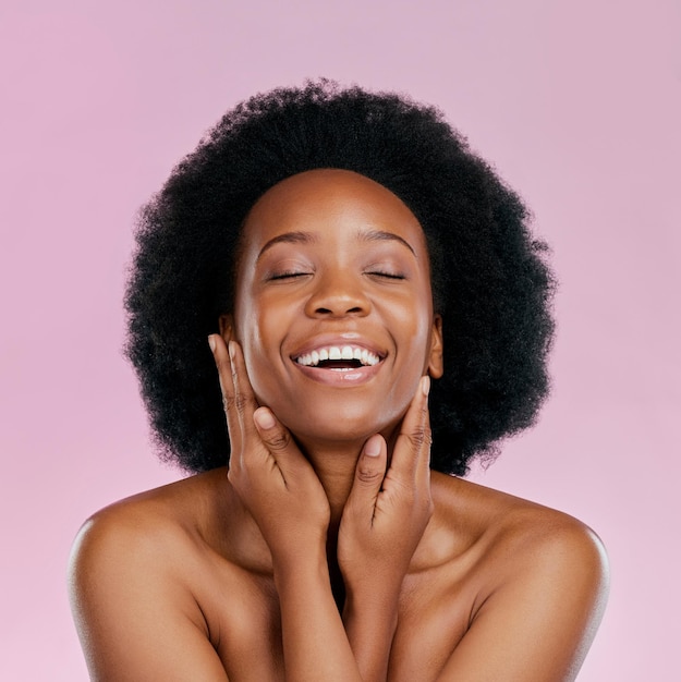 Funny beauty and black woman with skincare dermatology and makeup against a pink studio background female person model and girl with happiness cosmetics and humor with grooming luxury and smile