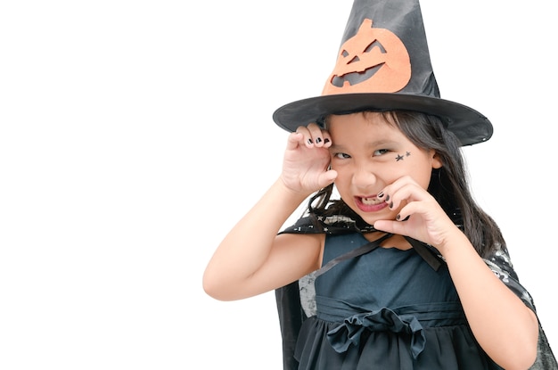 Funny child girl in witch costume for Halloween isolated 