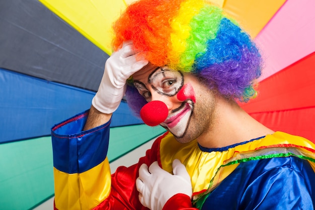 Funny clown in a colorful 