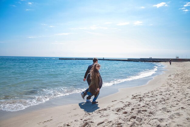 Funny couple near sea