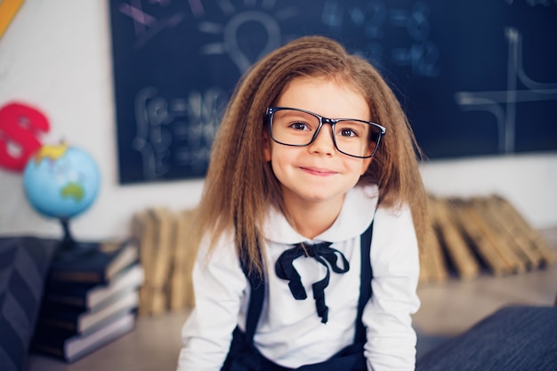 Funny crazy girl student with glasses